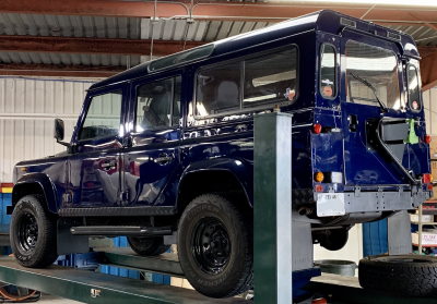 Land Rover Defender blue on lift